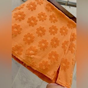 American Eagle orange daisy skort (extra small)
